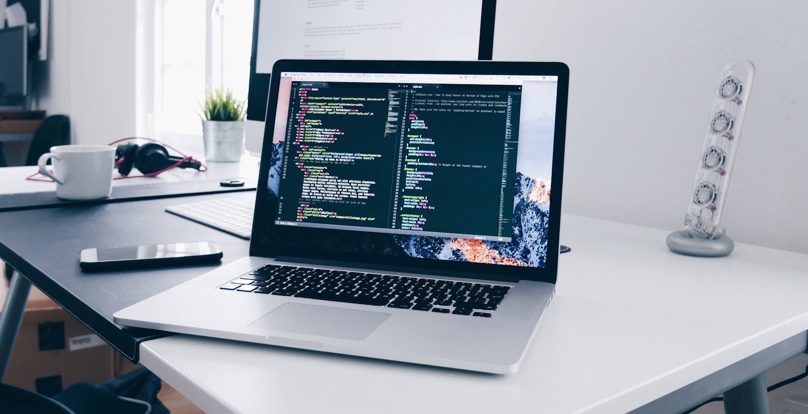 A developer at a laptop preparing for a Shopware 6 technical interview.